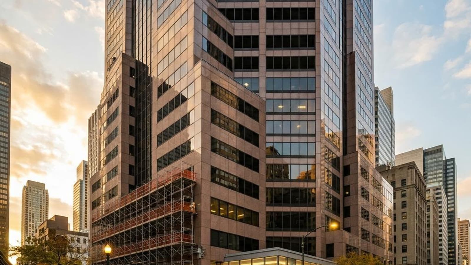 1980s office tower repositioning feasibility study — aging downtown office building under renovation